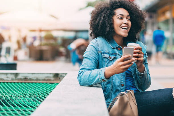 istock Beautiful girl with mobile phone 922965928