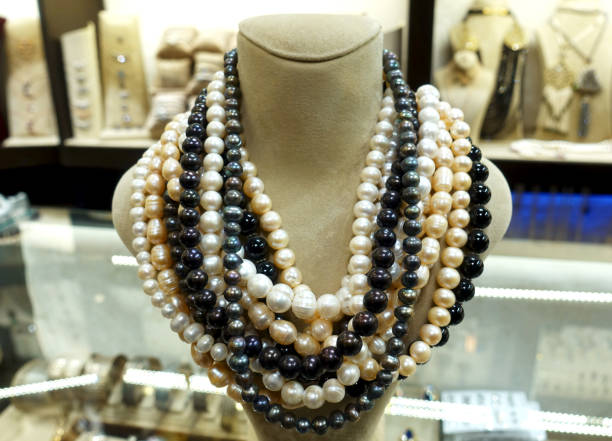 istock Many pearl necklaces of various colors 922968870