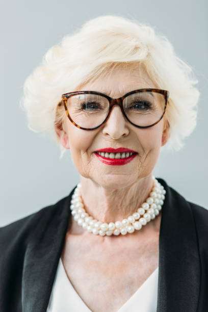 istock senior lady with pearl necklace 922979262
