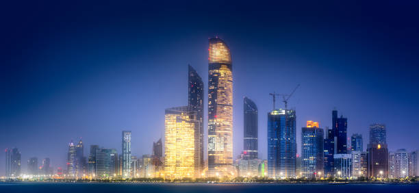 istock Panorama view of Abu Dhabi Skyline at sunset, UAE 922981132