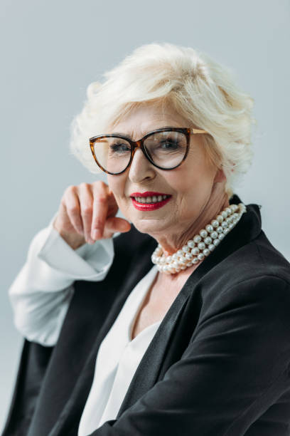 istock senior lady with pearl necklace 923000198