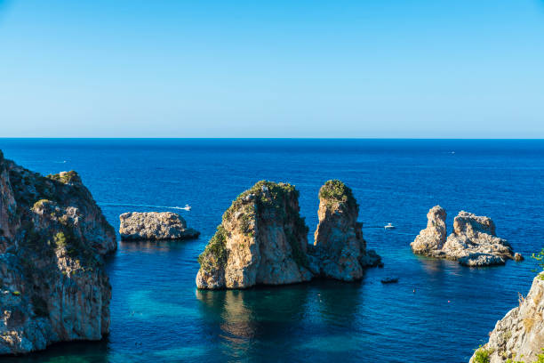 istock Cliffs on the coast in Scopello in Sicily, Italy 923007294