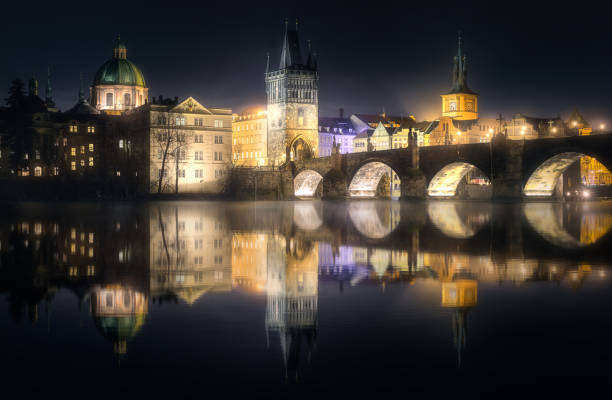 Night view of Charles bridge and Prague cityscape, Czech Republic.