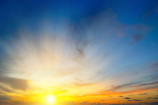 istock Cloudy sky and bright sunrise over the horizon. 923027436