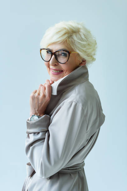 istock beautiful lady in trench coat 923027466