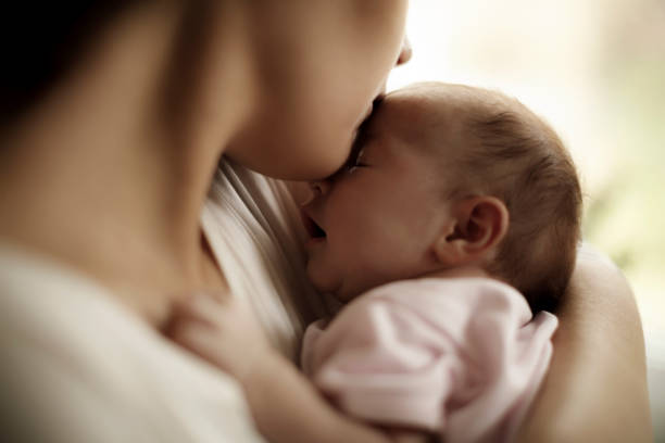 istock Mother and baby at home 923027626