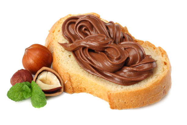 istock Slice of bread with chocolate cream with hazelnut isolated on white background 923027842