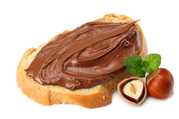 istock Slice of bread with chocolate cream with hazelnut isolated on white background 923027850