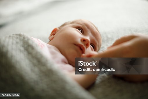 istock Newborn baby holding mother's hand 923028856
