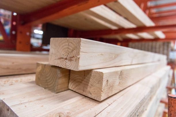 istock Stacks of lumber in a large warehouse 923031230