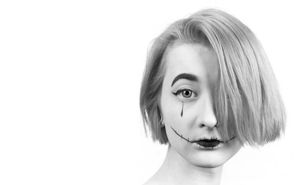 istock Girl with makeup on her face. 923031896
