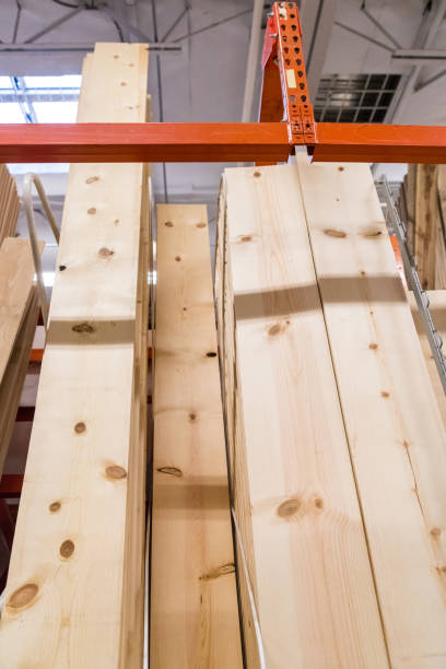 istock Stacks of lumber in a large warehouse 923035180