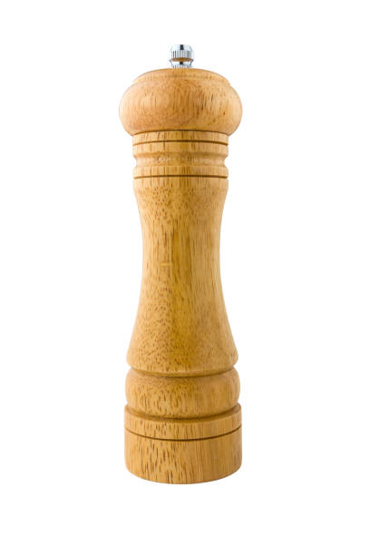 Kitchen grinder for spices. A wooden mill for spices isolated on a white background.