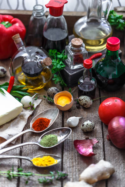 istock Various spices, oils and sauces selection on wooden background 923048604