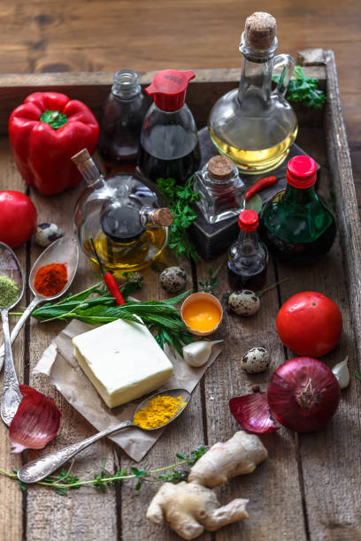istock Various spices, oils and sauces selection on wooden background 923048794