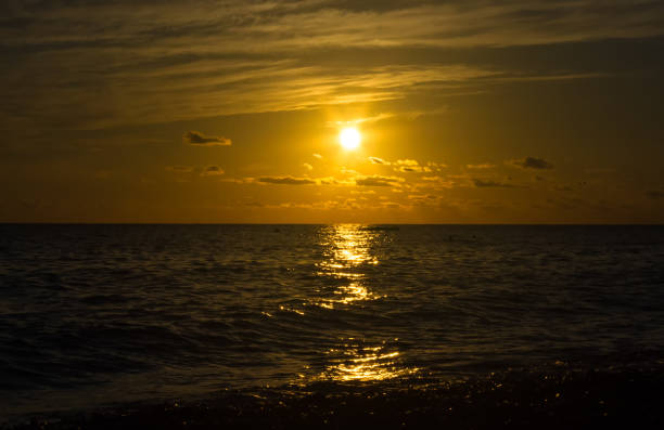 istock Amazing sea sunset, the sun, waves, clouds 923052748