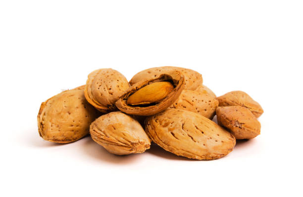 istock Macro view of shelled almond. Almonds in their shells. 923058720