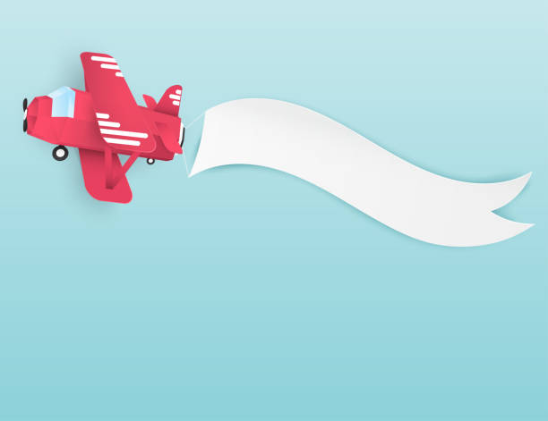 istock Airplane aerial view paper art with paper banner for text. 923062920