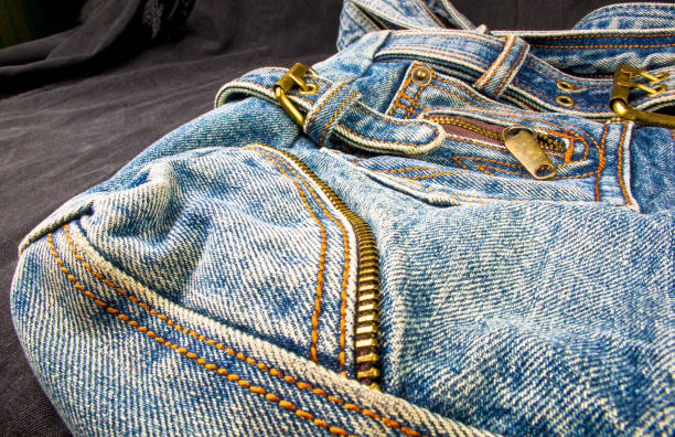 istock fittings on the jeans hand bag 923065396