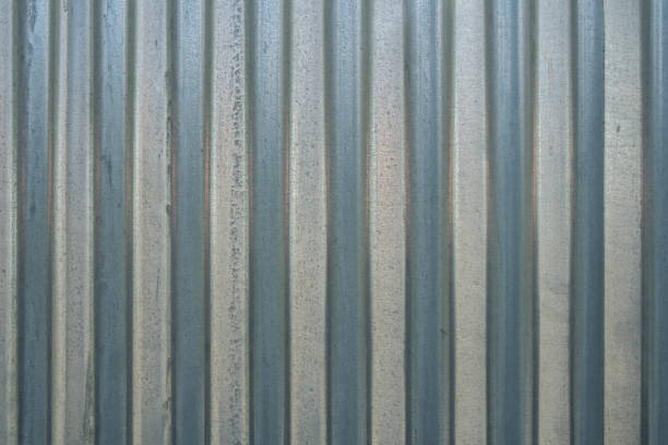 istock Corrugated metallic slates for roofing, texture 923066196
