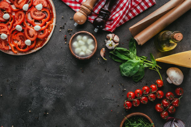 istock top view of raw pizza with ingredients on concrete table 923069364