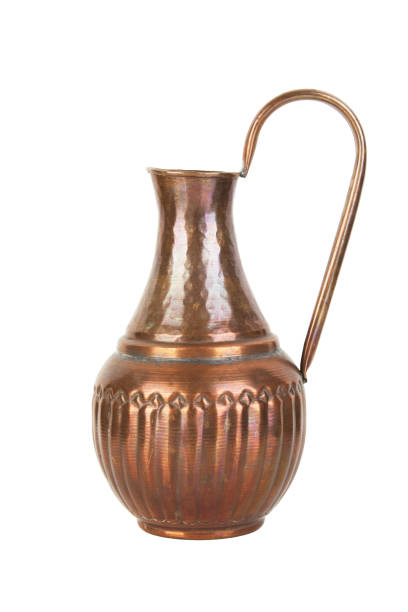 istock Vintage copper jug isolated on white 923072780