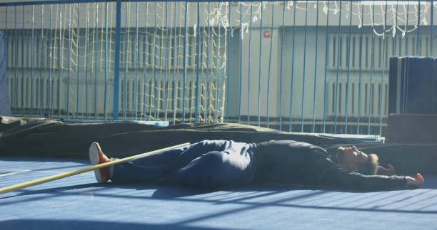 istock Athlete rest on the floor in the hall 923085726