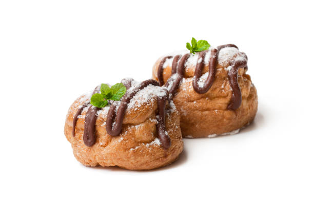 istock Belgian  chocolate choux buns isolated on white 923092054