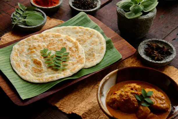 Photo of Roti Prata with Chicken Curry