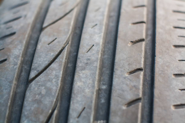 istock Car summer season tire look up 923099516