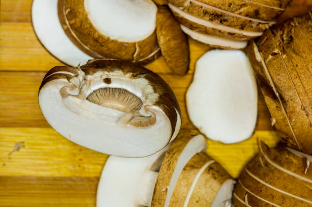 istock sliced before cooking fresh king mushrooms champignons on a bamboo Board 923099564