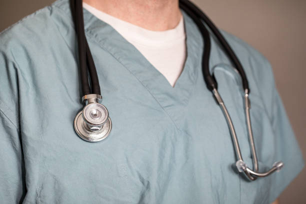 istock Doctor, Nurse, Or Surgeon With Scrubs And A Stethoscope 923099956