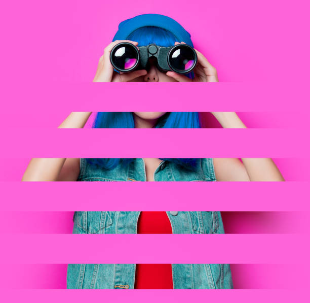 istock hipster girl with blue hair and binoculars 923100064