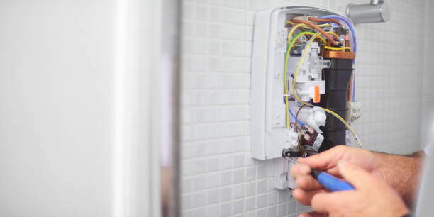 istock Screwing new shower unit to the wall 923100530