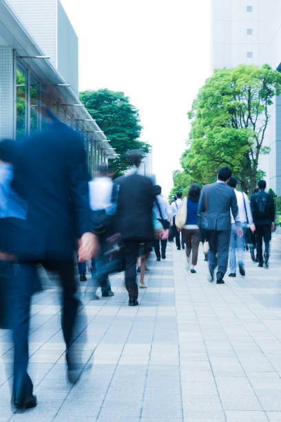 istock Crowds of Commuters Walking Through Pedestrian Walkway 923102930