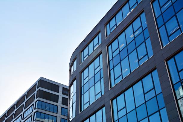 istock Modern building. Modern office building with facade of glass 923103232