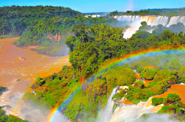 istock Fantastic view of Iguazu falls at sunset time. 923103234