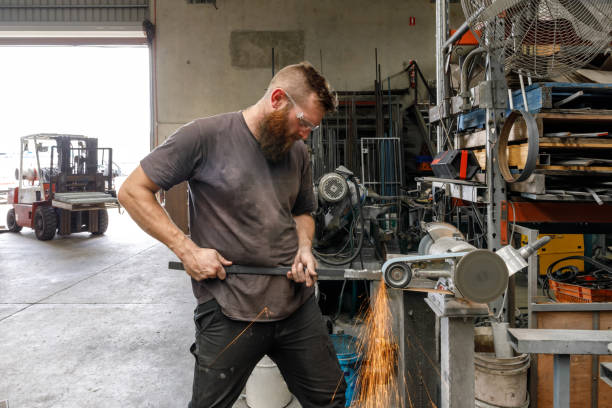 istock Australian Metal Worker Using Power Tool In Factory 923113954