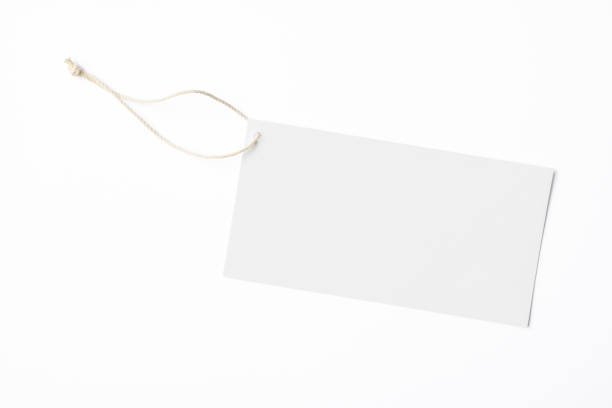 Overhead shot of blank white tag, isolated on white with clipping path.