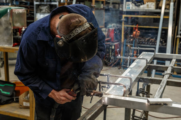 istock Metal Worker Welding In Factory 923114596