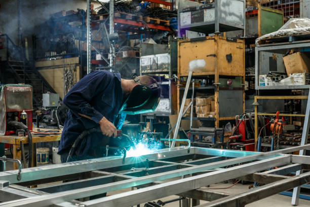 istock Metal Worker Welding In Factory 923114634