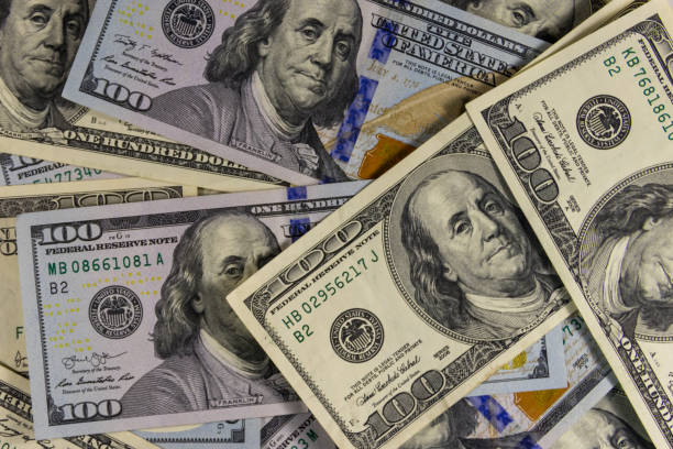 istock Background of one hundred dollar bills 923117092