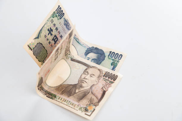 istock japanese money on white background 923117466