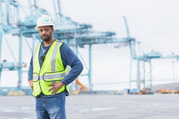 istock Dock worker at shipping port 923127666