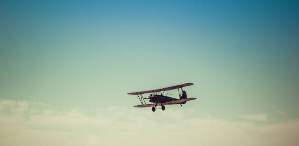 istock Biplane in the sky, in the air 923142220