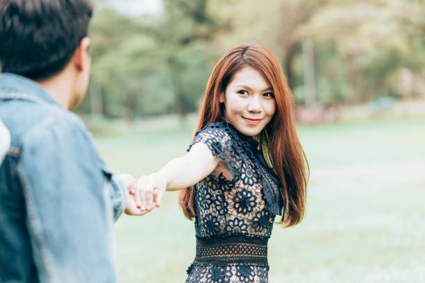 istock Asian couple lovers hold one's hands 923142488
