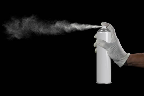 Hand and finger pushing spray can