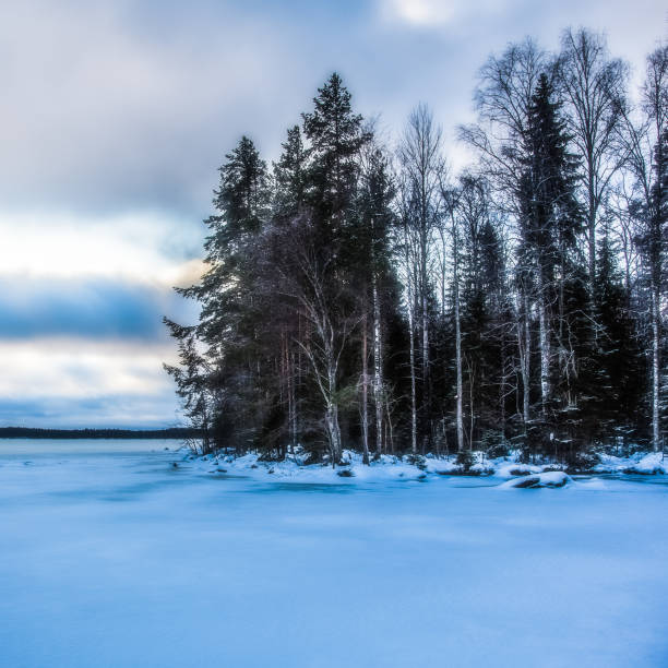 istock Winter landscape, lake is in the snow 923152464