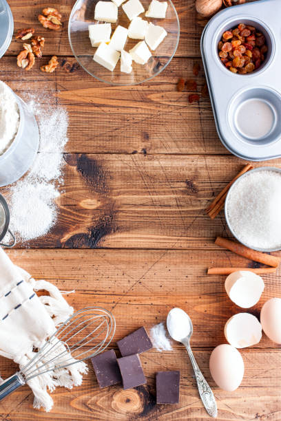 istock Baking background. Cooking ingredients for dough and wooden board on white rustic wood. Top view with copy space, recipe or culinary classes. 923162714