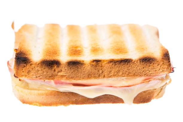 istock One ham and cheese sandwiches from the front on white background 923163332